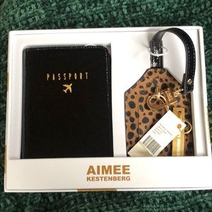 Aimee Kestenberg passport book and luggage tag.